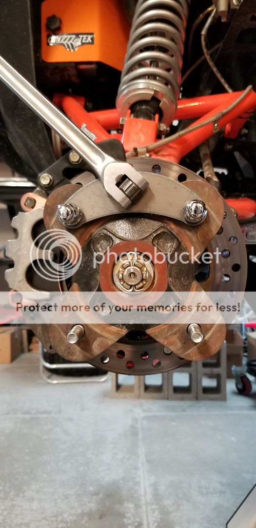 Torquing the axle nut on a General Polaris General 1000 Forum